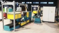 Conformadora integrada de fuelles neumáticos