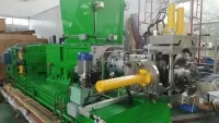 Extrusora de doble tornillo serie T con sección de formación de láminas